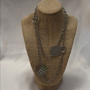 Long silver costume necklace